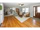 Bright living room featuring hardwood floors and access to the kitchen at 19702 Tomlinson Rd, Westfield, IN 46074