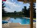 Refreshing pool surrounded by lush greenery and scenic views at 19702 Tomlinson Rd, Westfield, IN 46074