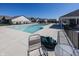 A community pool area with lounge chairs and nearby residential buildings at 20133 Willenhall Way, Westfield, IN 46074