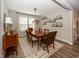Bright dining area featuring modern decor, wooden accents, and plenty of natural light at 20133 Willenhall Way, Westfield, IN 46074