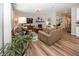 Inviting living area with stylish furnishings, a cozy fireplace, and an open layout for seamless entertaining at 20133 Willenhall Way, Westfield, IN 46074