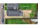 Birds-eye view of a home showcasing its roof, yard, and surrounding neighborhood at 2118 Lexington Ave, Indianapolis, IN 46203