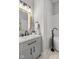 Bathroom showcasing a sleek vanity and a modern faucet next to the free standing tub at 2118 Lexington Ave, Indianapolis, IN 46203