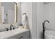 Bathroom showcasing a sleek sink and a modern faucet next to the walk in shower at 2118 Lexington Ave, Indianapolis, IN 46203