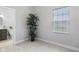 Serene bedroom with neutral carpet, and view into the attached bathroom at 2118 Lexington Ave, Indianapolis, IN 46203