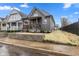 Inviting home exterior showcasing the landscaped front yard and cozy front porch at 2118 Lexington Ave, Indianapolis, IN 46203