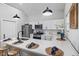 Contemporary kitchen with a large island, stainless steel appliances, and stylish pendant lighting at 2118 Lexington Ave, Indianapolis, IN 46203