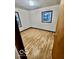 Bright bedroom features wood-look floors and a window for natural light at 213 Harrell Dr, Edinburgh, IN 46124