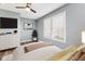 Bright bedroom featuring wood floors and a window for natural light at 2511 Countryside Westview Dr, Shelbyville, IN 46176