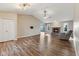 Open living space with hardwood floors and a fireplace, creating a warm and inviting atmosphere at 2511 Countryside Westview Dr, Shelbyville, IN 46176