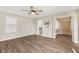 Bright primary bedroom with hardwood floors, large windows, and a walk-in closet at 2511 Countryside Westview Dr, Shelbyville, IN 46176