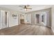 The main bedroom has wood-style floors and a ceiling fan and gets great natural light at 2511 Countryside Westview Dr, Shelbyville, IN 46176
