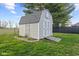 Backyard view of the storage shed with a ramp and access door at 2511 Countryside Westview Dr, Shelbyville, IN 46176