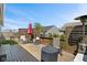 Outdoor deck with wicker furniture, privacy screen, and grill area offers a great entertaining space at 2936 W Calimanco Ln, Monrovia, IN 46157