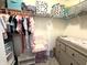 Well-organized closet featuring clothing, shelving, and storage for toys, offering a practical and cute space at 2936 W Calimanco Ln, Monrovia, IN 46157