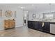 Spacious open floorplan kitchen with a beautiful cabinet island and a view of adjacent rooms at 2936 W Calimanco Ln, Monrovia, IN 46157