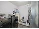 Convenient laundry room features modern washer and dryer plus updated water heater and automated litter box at 2936 W Calimanco Ln, Monrovia, IN 46157