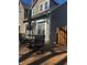 A home with a large wooden deck with backyard furniture, perfect for entertaining guests at 300 E Monroe St, Franklin, IN 46131