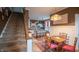 Inviting dining area adjacent to the kitchen with hardwood floors and elegant furnishings at 300 E Monroe St, Franklin, IN 46131