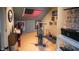 Spacious home gym with exercise equipment, wall art, and ample space at 300 E Monroe St, Franklin, IN 46131