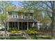 Charming two-story home with a welcoming front porch and manicured landscaping at 300 E Monroe St, Franklin, IN 46131