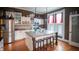Spacious kitchen features an island with seating and stainless steel appliances at 300 E Monroe St, Franklin, IN 46131