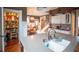 Well-appointed kitchen features a pantry, an island and hardwood floors at 300 E Monroe St, Franklin, IN 46131