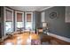 Relaxing living room with natural light, hardwood floors, and stylish decor at 300 E Monroe St, Franklin, IN 46131