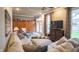 Cozy living room with hardwood floors, built-in storage, and ample seating at 300 E Monroe St, Franklin, IN 46131