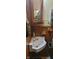 Bathroom with wood paneled walls, a curved sink, and unique decor at 3311 Stella St, Greenwood, IN 46143