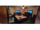 Bedroom with a ceiling fan, blue curtains, and an assortment of furniture at 3311 Stella St, Greenwood, IN 46143