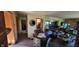 Living room showcasing wood door frames, a mirror, and furniture at 3311 Stella St, Greenwood, IN 46143