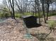 Private wooded area with a rustic outbuilding and metal roof at 3311 Stella St, Greenwood, IN 46143