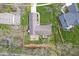 Aerial view of a home featuring a large backyard, a wooden deck, and mature trees at 334 Stonehedge Dr, Carmel, IN 46032