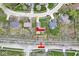 Overhead view showing a well-located home near the Monon Trail, surrounded by lush greenery and neighborhood streets at 334 Stonehedge Dr, Carmel, IN 46032