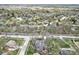 Expansive aerial view of houses, trees, and city buildings extending toward the horizon at 334 Stonehedge Dr, Carmel, IN 46032