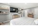 Bedroom featuring gray walls, gray carpet, a television, shelving and two dressers at 334 Stonehedge Dr, Carmel, IN 46032