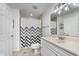 Bathroom with single sink vanity, shower-tub combination, and patterned shower curtain at 3462 Briar Creek Ln, Carmel, IN 46033