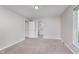 Neutral bedroom with carpet flooring, two doors and one window at 3462 Briar Creek Ln, Carmel, IN 46033