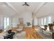 Open-concept living room with vaulted ceilings and lots of natural light at 3462 Briar Creek Ln, Carmel, IN 46033