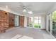 Relaxing sun room with sliding glass doors and carpet flooring at 3462 Briar Creek Ln, Carmel, IN 46033