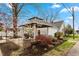 Picturesque backyard with a charming gazebo, lush greenery, and delightful landscaping at 350 W Pearl St, Greenwood, IN 46142