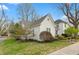 A lovely view of a beautiful home with manicured landscaping and lush green grass at 350 W Pearl St, Greenwood, IN 46142