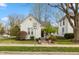 Charming home featuring a well-manicured lawn and inviting curb appeal at 350 W Pearl St, Greenwood, IN 46142