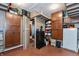 Garage with lofted storage, organization cabinets and shelving and large storage capacity at 350 W Pearl St, Greenwood, IN 46142