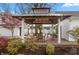 Covered gazebo with a table, chairs, and a swing, perfect for outdoor entertaining at 350 W Pearl St, Greenwood, IN 46142