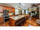 Stylish kitchen with an island, granite counters, stainless appliances, and lots of natural light at 350 W Pearl St, Greenwood, IN 46142