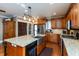 Spacious kitchen with a large island, granite countertops, and stainless steel appliances at 350 W Pearl St, Greenwood, IN 46142