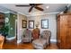 Cozy sitting area with leather chairs, hardwood floors, and rustic decor at 350 W Pearl St, Greenwood, IN 46142