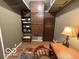 Home office area with built-in shelving, desk, and a cozy rug at 350 W Pearl St, Greenwood, IN 46142